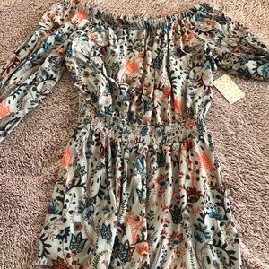 Free people open back romper NEVER WORN